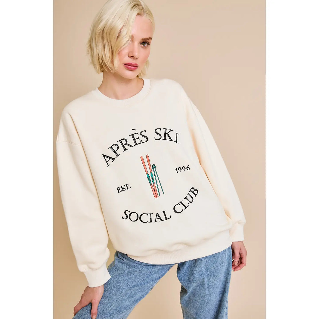 Apres Ski Club sweatshirt.